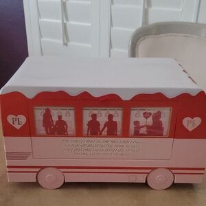 Red and White Toy Bus